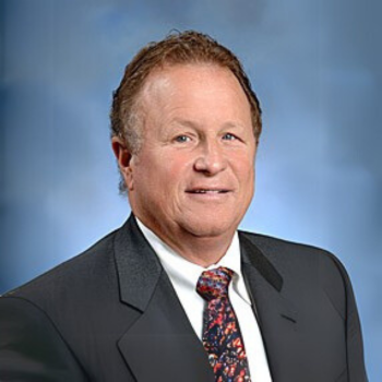 ROBERT J. KNESAL